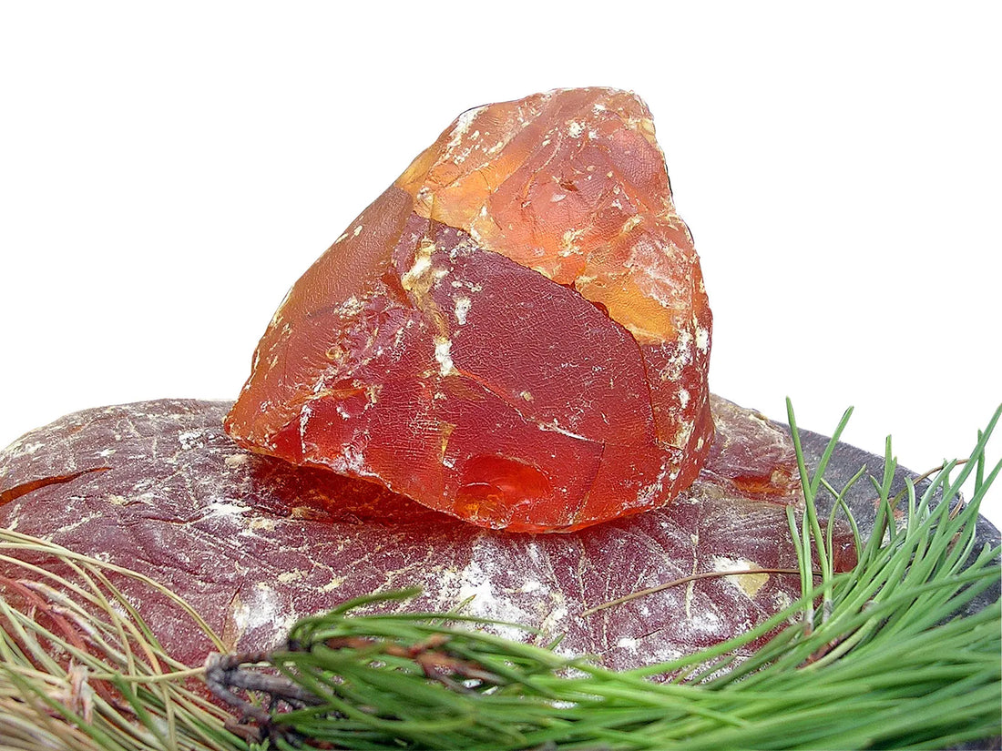 A chunk of rosin is displayed to show leather care enthusiasts what it looks like.