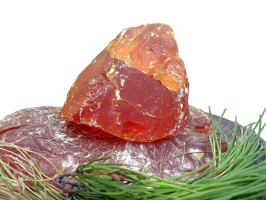 A chunk of rosin is displayed to show leather care enthusiasts what it looks like.