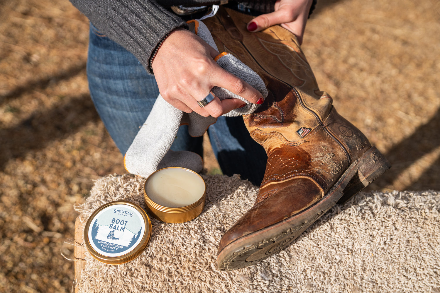 leather conditioner application on flex points of boot ankle and toe box